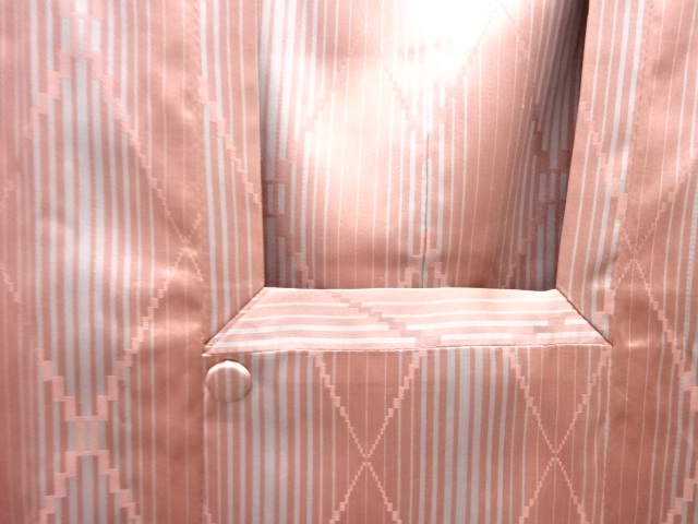  菱模様織り出し雨コート